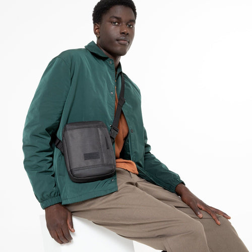 man wearing The One Cnnct Melange Shoulder Bag