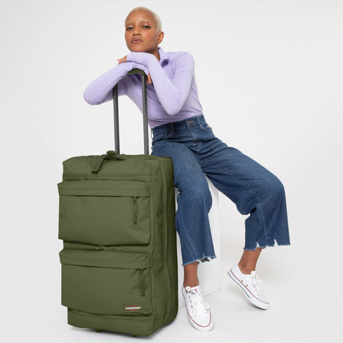 woman  using Double Tranverz M Dark Grass suitcase