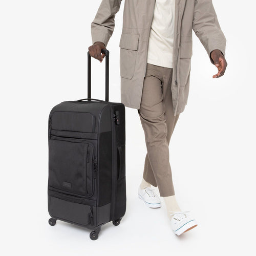 person using Ridell L Cnnct Coat Roller Luggage