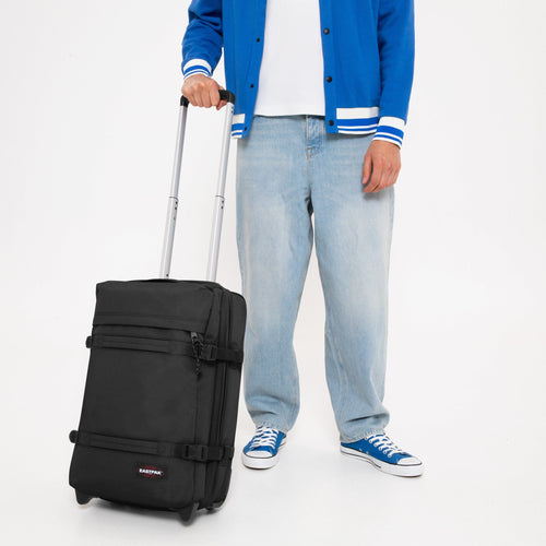 person using Transit'R S Black luggage