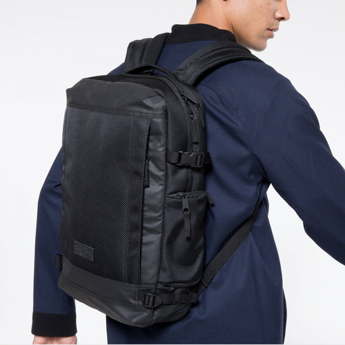 Tecum M Cnnct Coat Professional Backpack On Model's Back