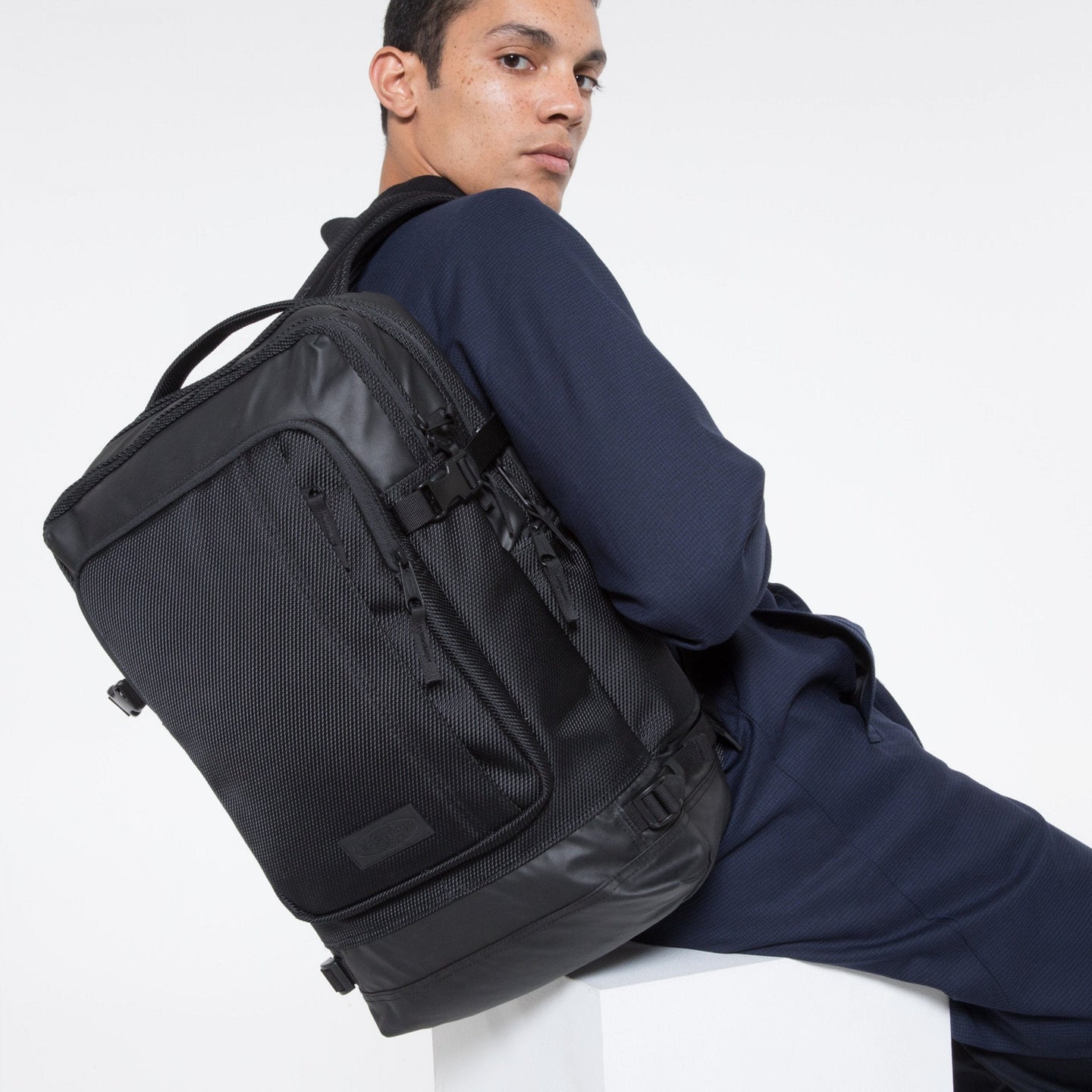 Tecum L Cnnct Coat Professional Backpack Front View Over Shoulder Of Model
