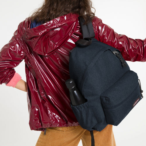 Padded Zippl'r + Triple Denim Backpack Front View With Backpack On Shoulder of Model