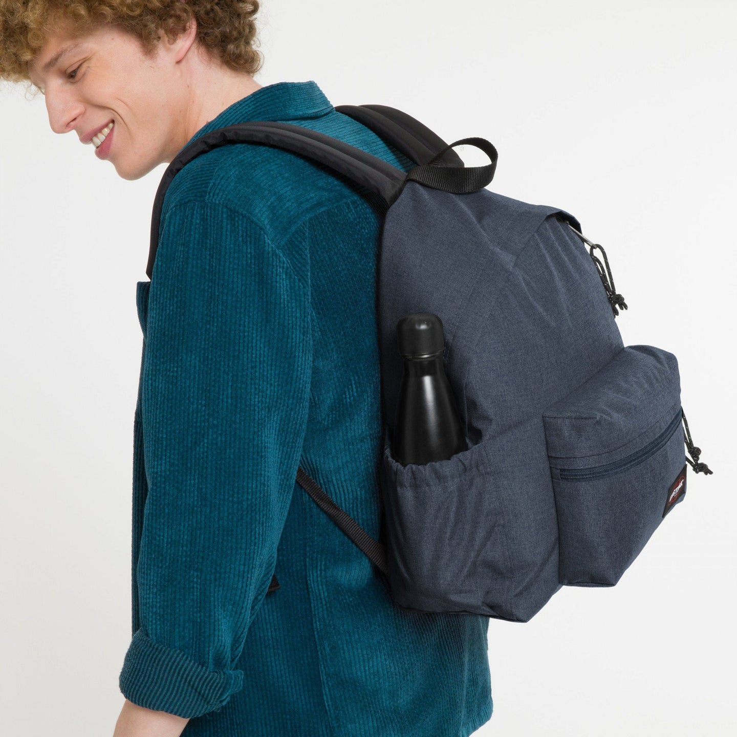 man wearing Padded Zippl'r + Crafty Jeans Backpack Side View