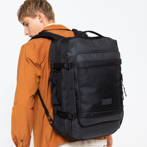 Travelpack Cnnct Coat Travel Bag Side View On Model's Back