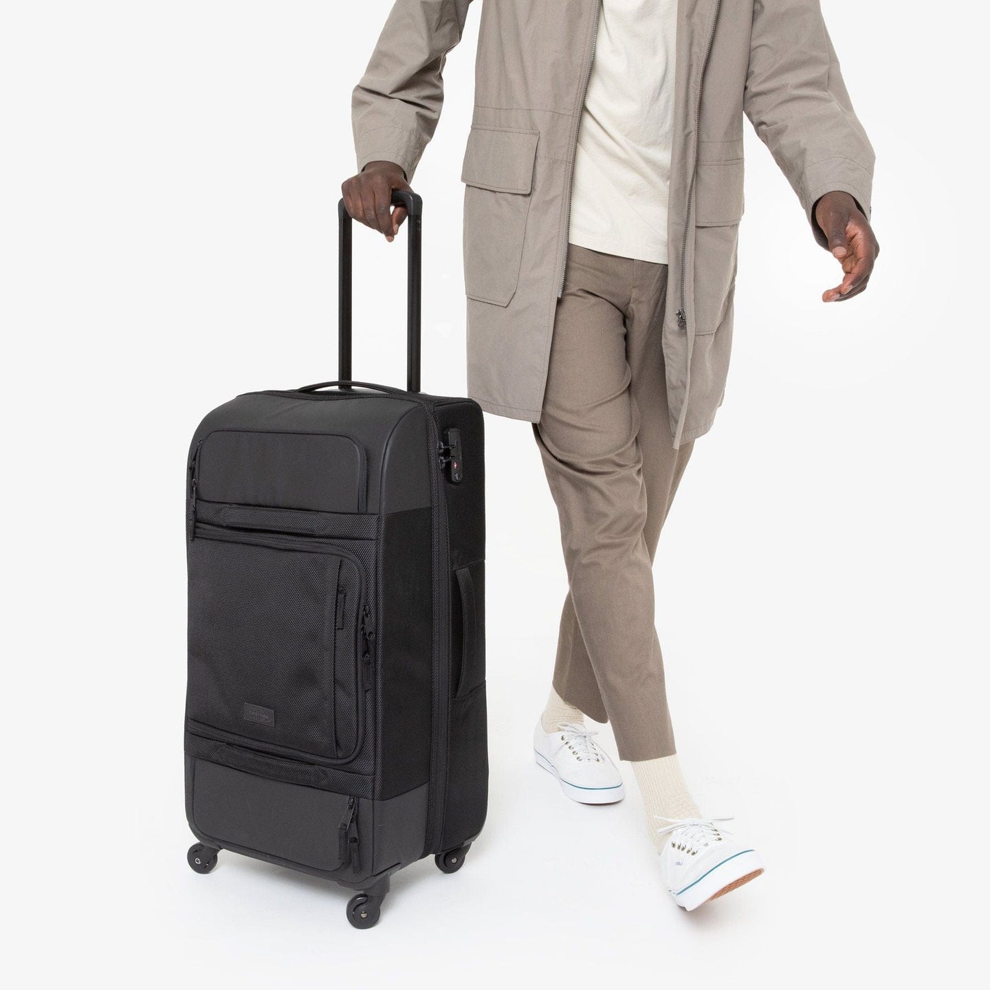person using Ridell L Cnnct Coat Roller Luggage