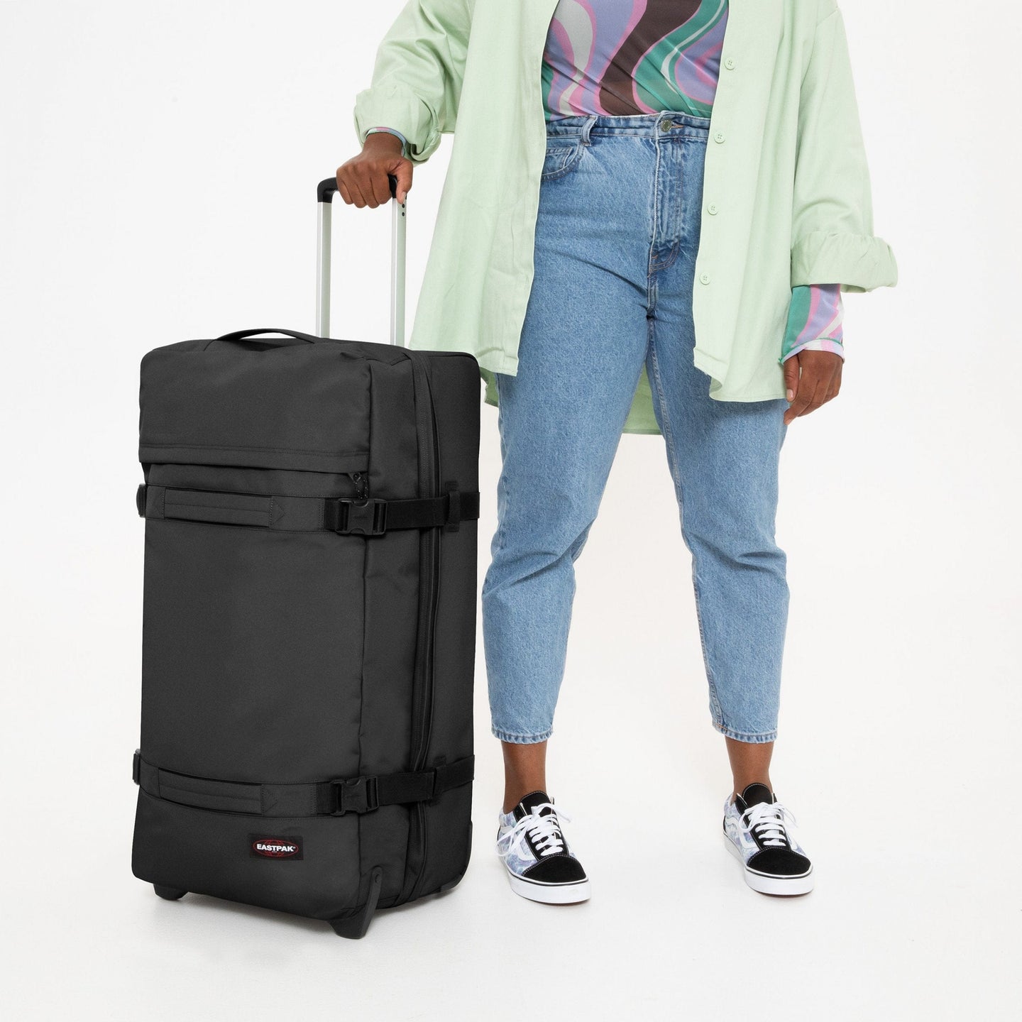 person using Transit'R L Black luggage
