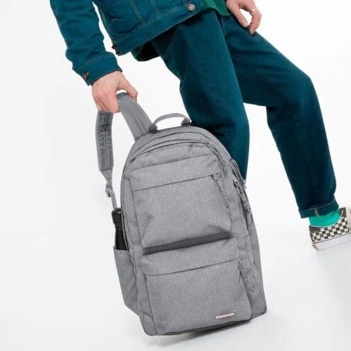 person holding Parton Sunday Grey Backpack